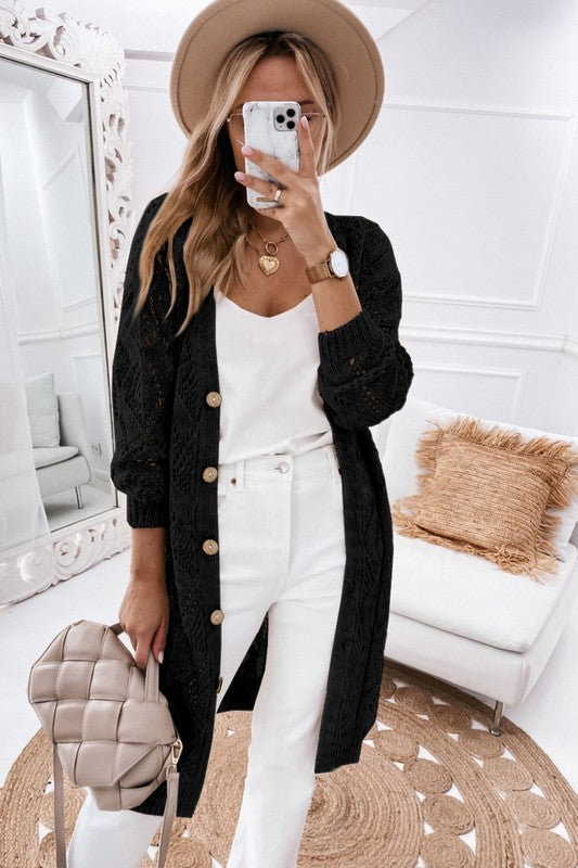Faith , Fashion and Grace - Stylish woman in casual outfit featuring a black cardigan and white jeans, embodying modern women's fashion.