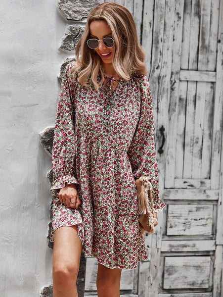 Long sleeve floral printed dress from women's boutique, perfect for casual and elegant events, a stylish choice in women's fashion.