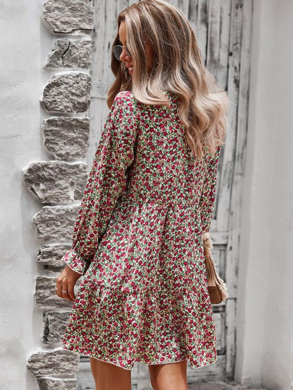 Long sleeve floral printed dress from women’s boutique, perfect for casual outings or elegant events in stylish women’s fashion.