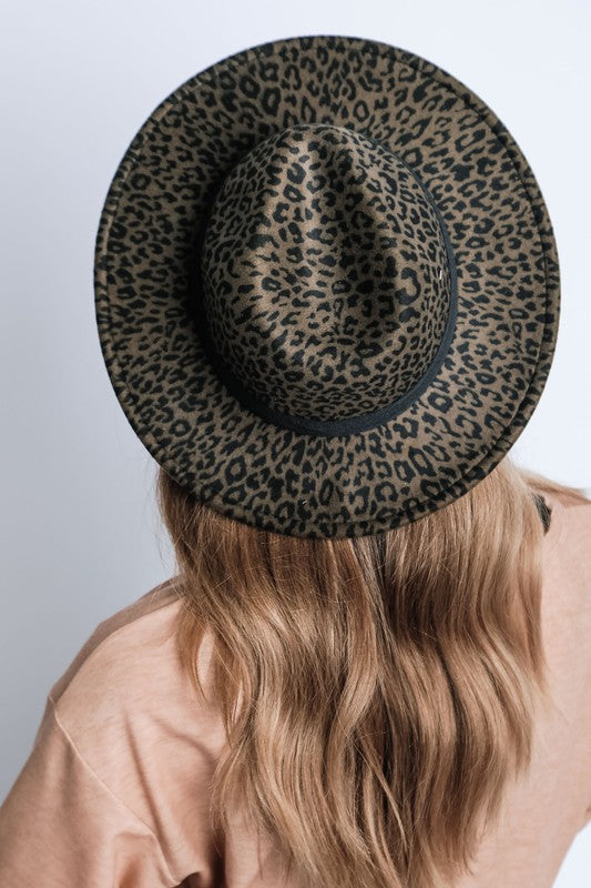 Faux suede Gatsby style fedora from a women's boutique, featuring a trendy leopard print design, perfect for stylish ladies.