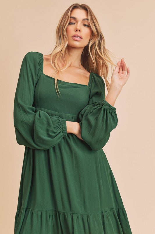 Taya Dress in green, women’s boutique elegant style.