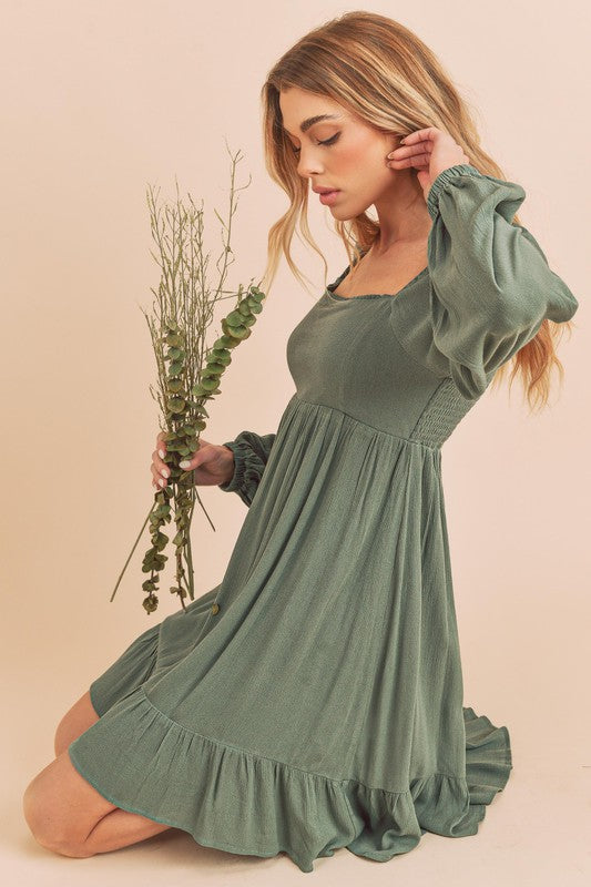 Taya Dress from women’s boutique, ideal for formal occasions.