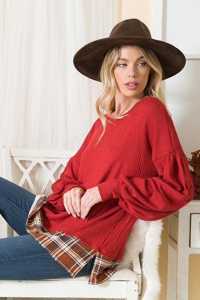 Balloon Sleeve Top with Plaid Print Contrast showcased in a women’s boutique, perfect for trendy ladies tops and casual dresses for women.