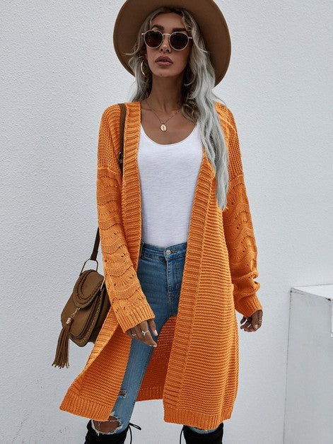 Women’s Long Sleeve Cardigan in orange, perfect for stylish women’s clothing and modern women’s fashion at a women’s boutique.
