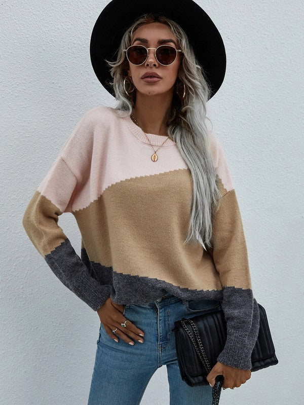 Women's Long Sleeve Round Neck Sweater in stylish color-block design, perfect for trendy women's clothing in a women's boutique.