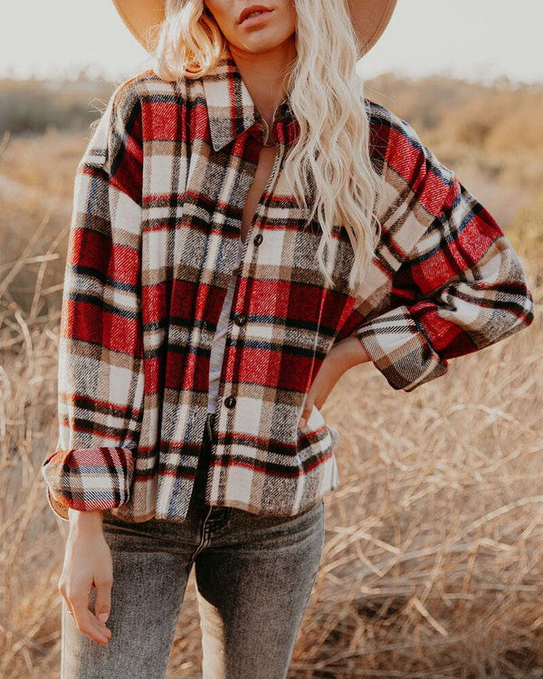 Stylish Women's Plaid Shacket from a women's boutique, perfect for layering in modern women's fashion.