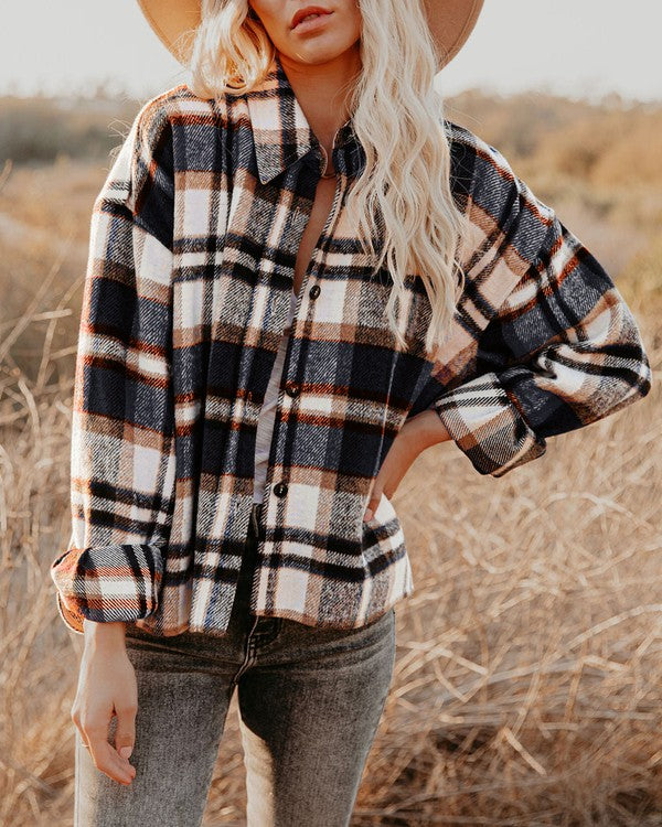 Women's Plaid Shacket in stylish plaid fabric, perfect for layering in a women's boutique, trendy ladies tops for casual days.