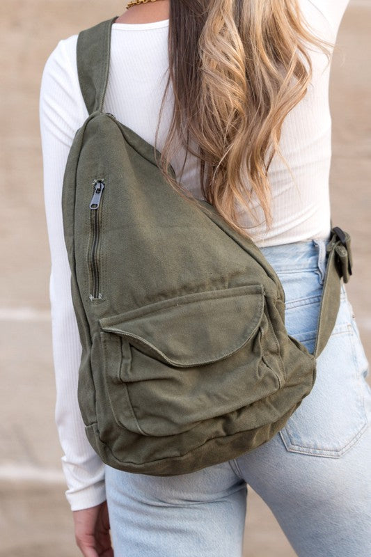 Oversized Canvas Sling in olive green, perfect for women’s boutique fashion.
