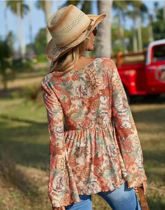 Western Printed Bell Sleeve Blouse featuring a floral design, perfect for women’s fashion at a women’s boutique.