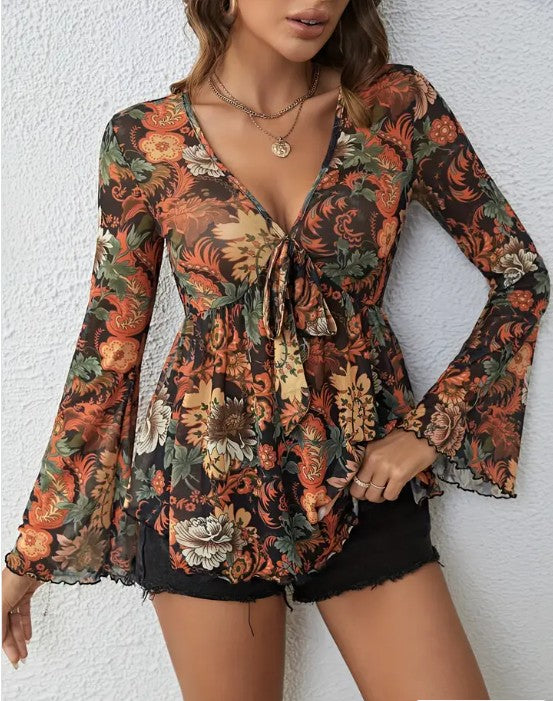 Western Printed Bell Sleeve Blouse featuring a floral design, for trendy women’s clothing at a women’s boutique.