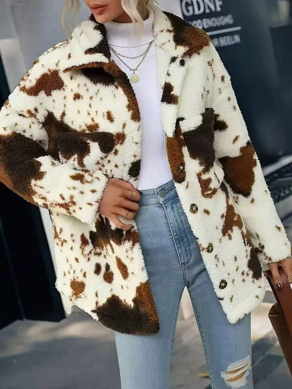 Stylish Cow Print Sherpa Jacket for women’s boutique. Perfect for trendy ladies fashion and casual dresses for women.