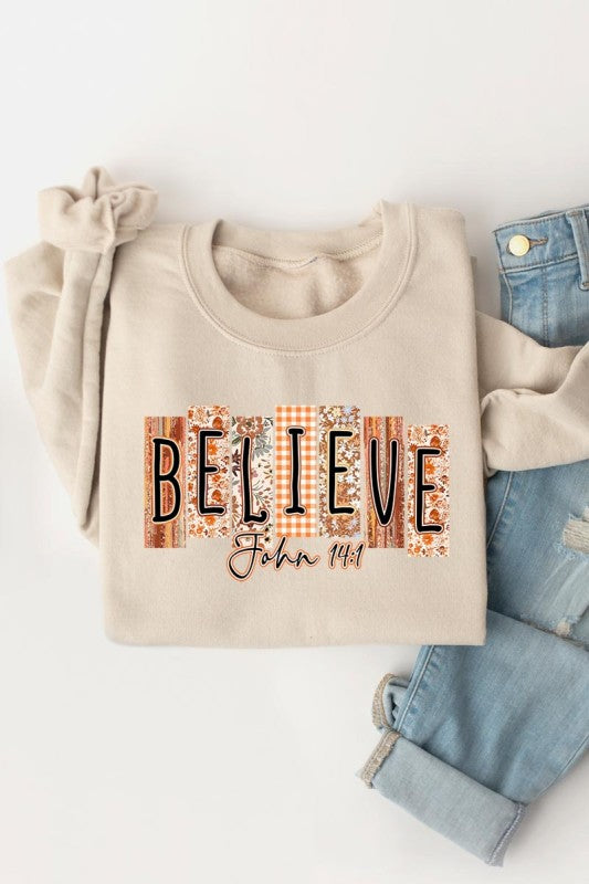 Believe Fall Christian Graphic Sweatshirt in beige featuring trendy design for women’s clothing at a women’s boutique.