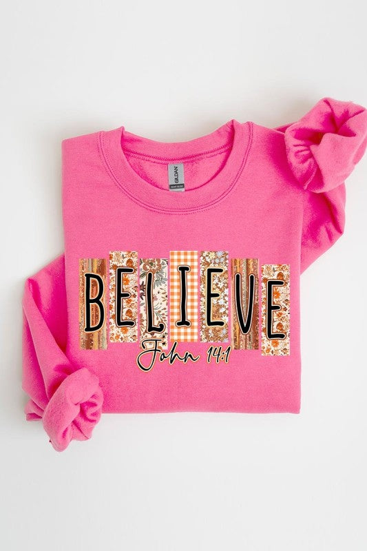 Believe Fall Christian Graphic Sweatshirt in bright pink, showcasing stylish women's clothing for contemporary ladies fashion.