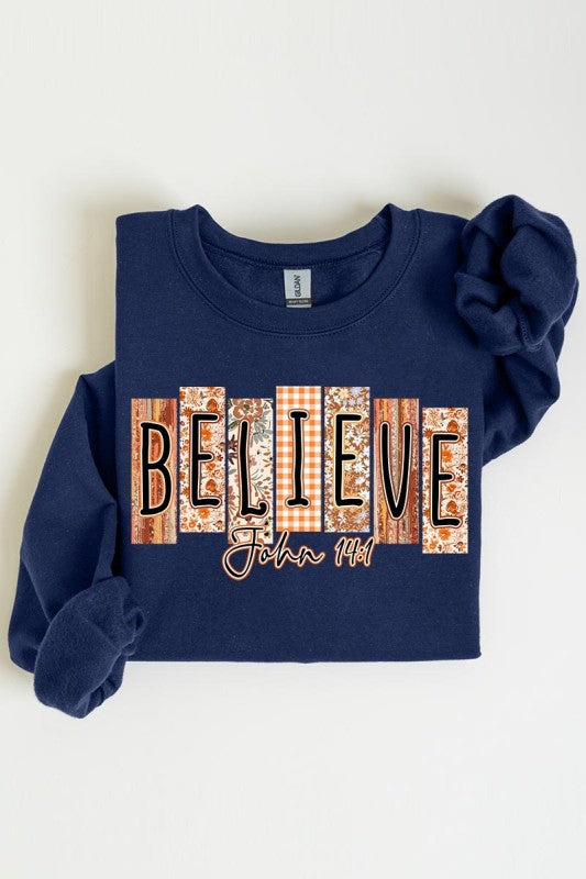 Believe Fall Christian Graphic Sweatshirt in navy for women’s boutique, perfect for modern women’s fashion and casual wear.
