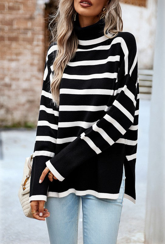 Women Mock Neck Sweater in black and white stripes at women’s boutique.