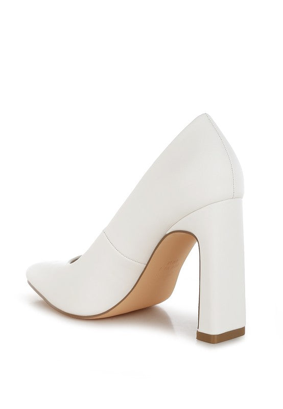 Shacarri Faux Leather Pumps style, elegant footwear from a women’s boutique for fashion-forward ladies.