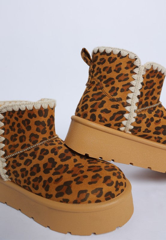 Rochas Leopard Print Snow Boots from a women's boutique