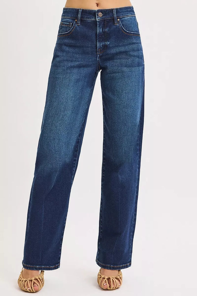RISEN Mid Rise Wide Baggy Jeans showcased in a stylish women's boutique for trendy women's clothing.