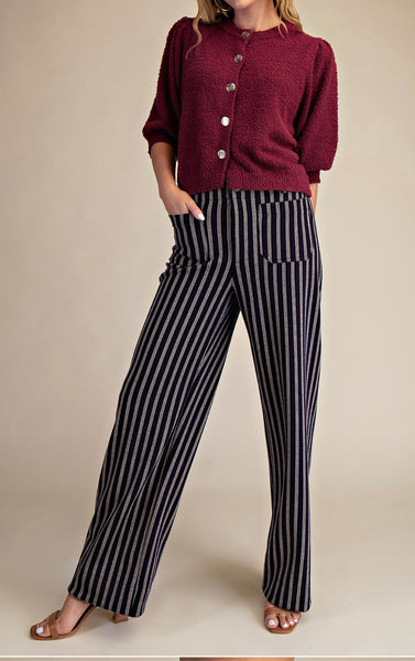 Stylish model wearing Full-Length Wide-Leg Pants with a cozy burgundy cardigan, perfect for women's boutique fashion.