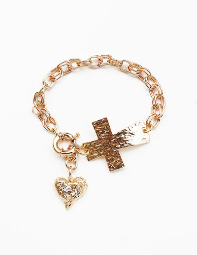 Stylish rose gold bracelet with a cross and heart charm, perfect accessory for modern women's fashion.