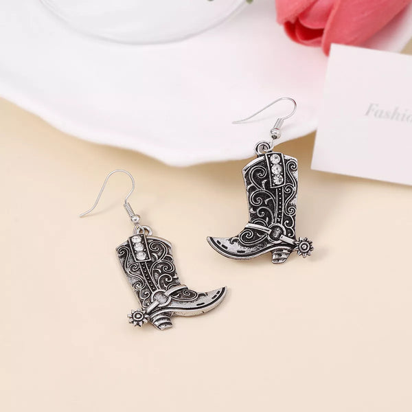 Vintage Western Cowboy Boot Dangle Earrings showcasing intricate design, a perfect accessory from a women’s boutique.