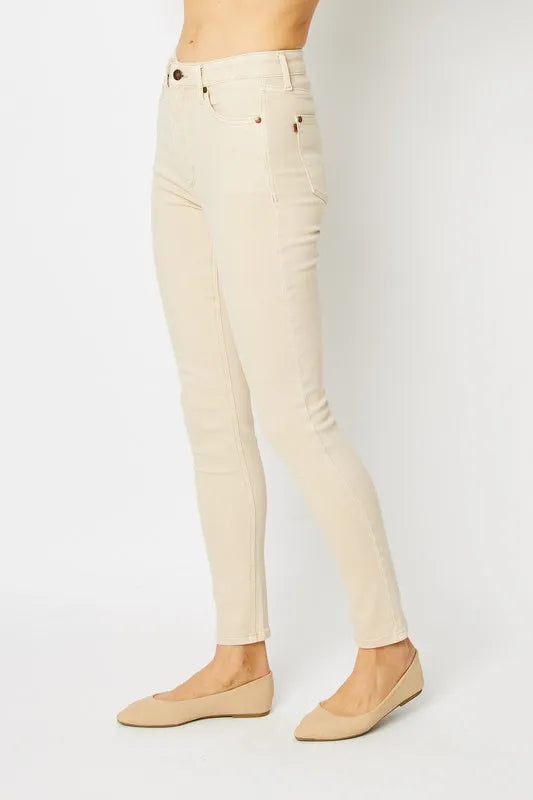 Judy Blue Full Size Garment Dyed Tummy Control Skinny Jeans showcased in a stylish fit, perfect for women’s boutique fashion.