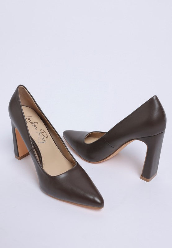 Shacarri Faux Leather Pumps in brown, stylish block heel design for elegant events and casual wear at a women’s boutique.