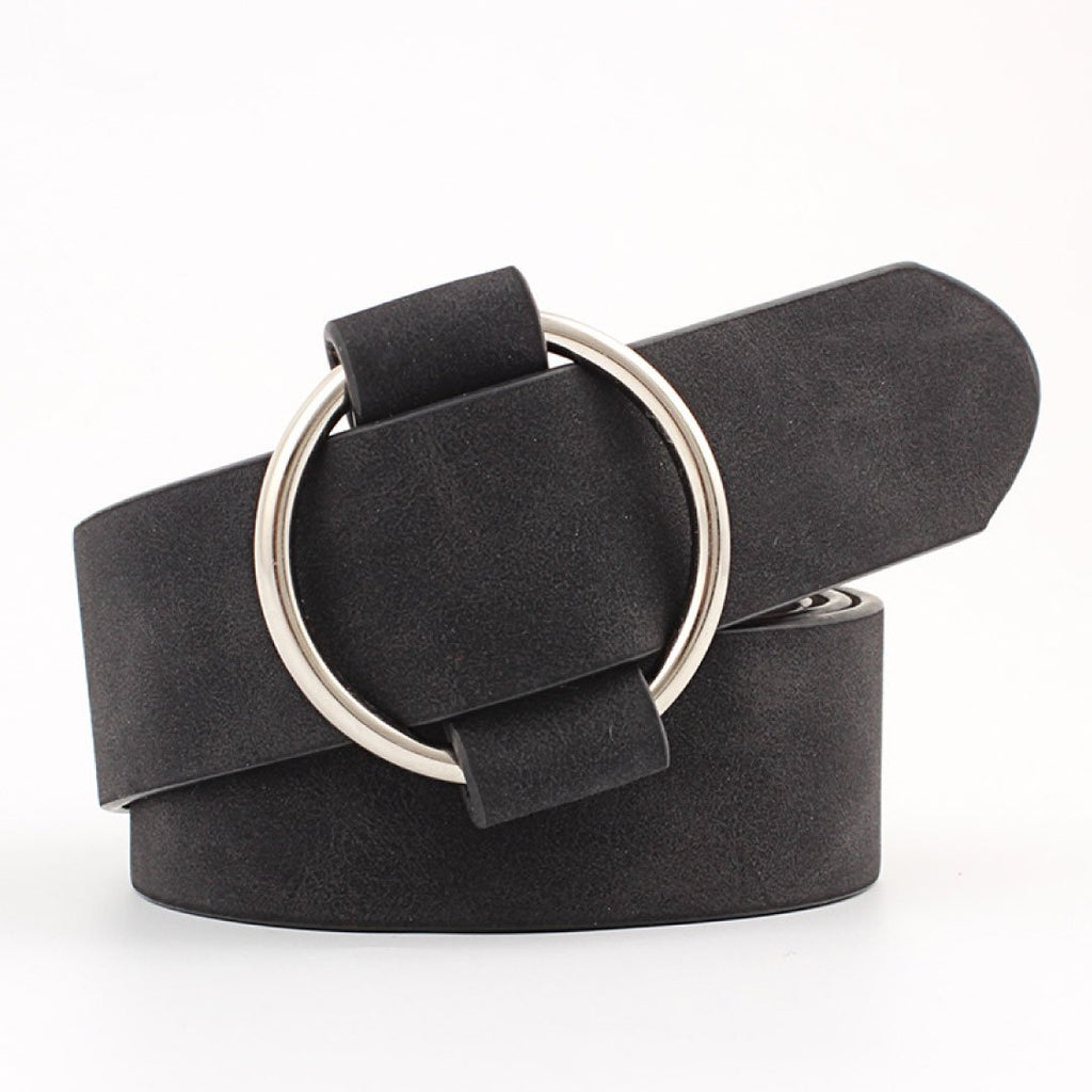 Lulu Belt in black with circular silver buckle, perfect for women’s fashion and stylish women’s dresses in a women’s boutique.