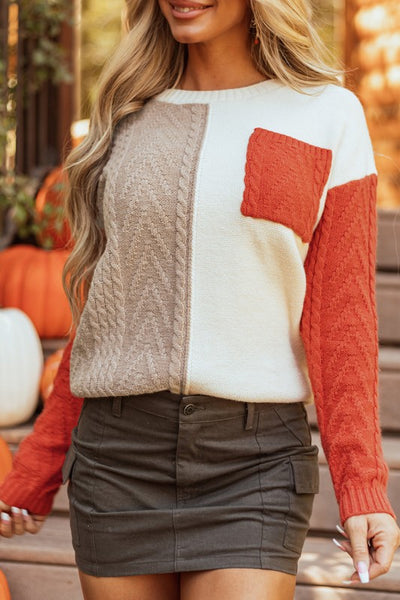 Colorblock Patch Pocket Drop Shoulder Sweater paired with a stylish skirt for trendy ladies fashion.