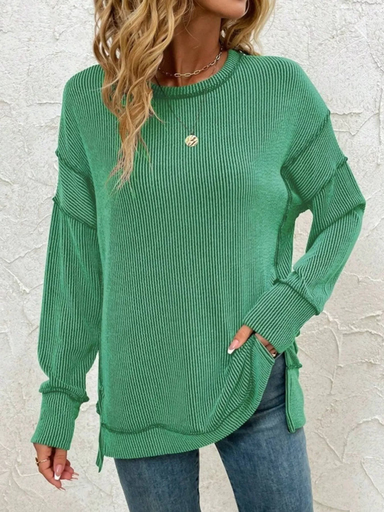 Stylish women’s sweatshirt featuring Side Slit Round Neck Dropped Shoulder design, perfect for women’s boutique and casual dresses for women.