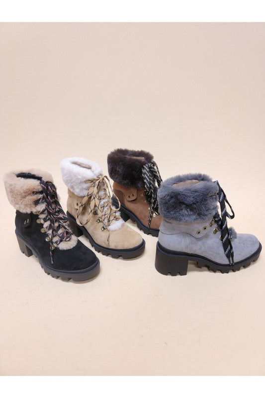VINI-FUR COMBAT BOOTIES in multiple colors featuring lace-up design and faux fur, perfect for trendy women's fashion.