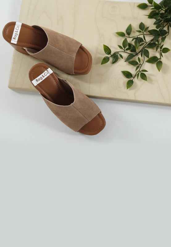 Masaki Soft Suede Leather Wooden Clogs from women’s boutique.