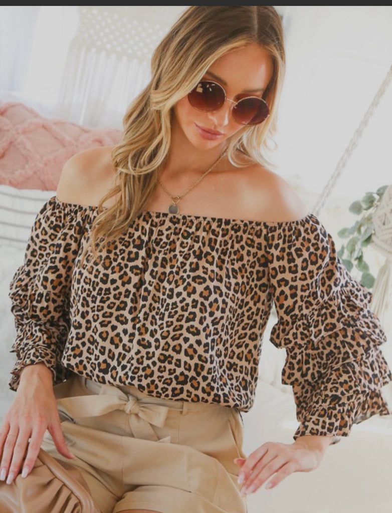 Off Shoulder Layered Ruffled Leopard Casual Tops from a women's boutique, featuring trendy ruffled sleeves and leopard print.
